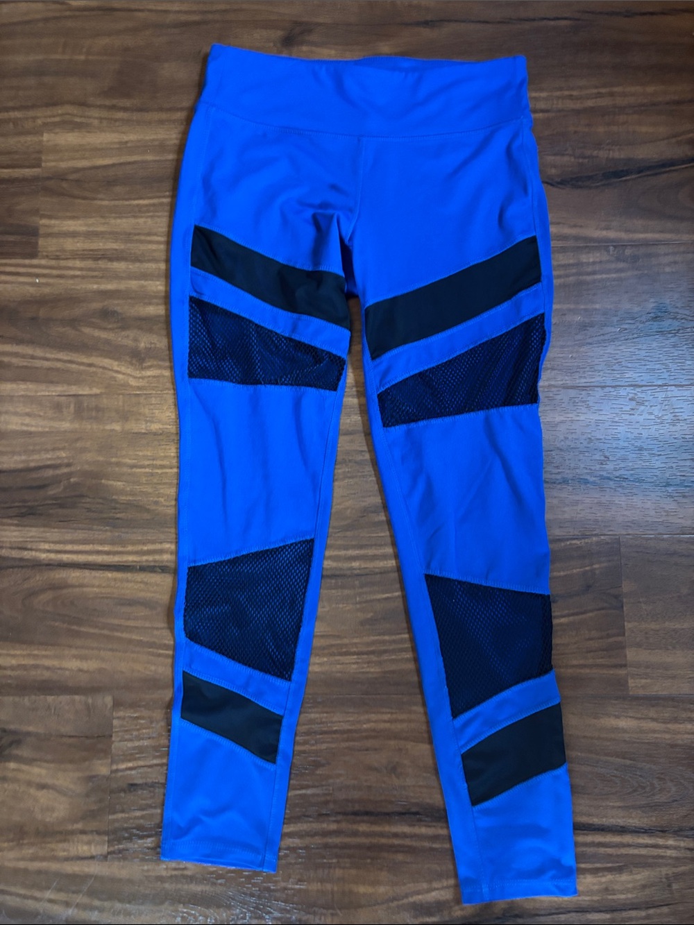 Blue woman’s ' Performance Leggings with Black Mesh Panels